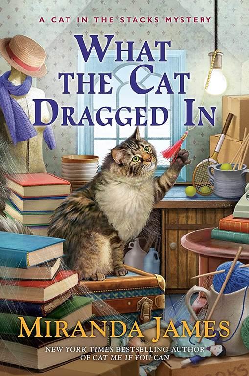 What the Cat Dragged In (Cat in the Stacks Mystery)